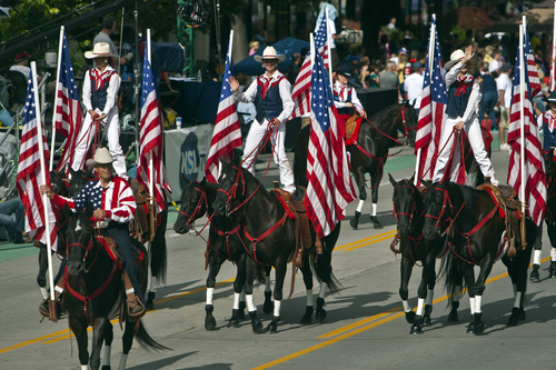 Chris Detrick  |  The Salt Lake Tribune
Riders in the patriotic horse group Americana's from Rexburg, Idaho, participate in the 163rd annual Days of '47 KSL 5 Parade Tuesday July 24, 2012.