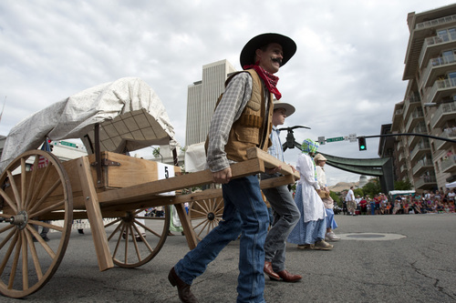 Chris Detrick  |  The Salt Lake Tribune
Sons of Utah Pioneers participate in the 163rd annual Days of '47 KSL 5 Parade Tuesday July 24, 2012.