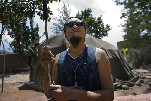 Scott Sommerdorf  |  The Salt Lake Tribune
Arnold Thomas who works with the Veterans Affairs Medical Center as a Native American Traditional Practitioner, stands outside a sweat lodge at the center.