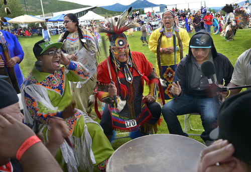 Scott Sommerdorf   |  The Salt Lake Tribune
The "Silent Hill" singers sing during a "straight song" during an inter-tribal dance at the Heber Valley Pow-Wow at Soldier Hollow, Sunday, June 15, 2014.