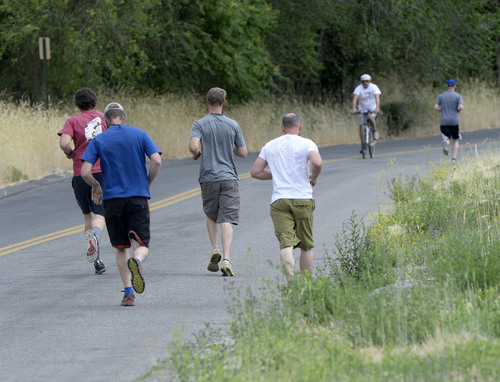 Al Hartmann  |  The Salt Lake Tribune 
People take excercise Monday June 17 in City Creek Canyon.  Get set for some cooler weather starting tomorrow.