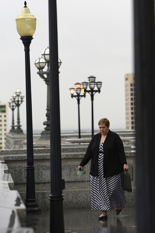 Leah Hogsten  |  The Salt Lake Tribune
Andrea Stubbs walks from the Utah Capitol, Tuesday, June 17, 2014 after a business meeting.