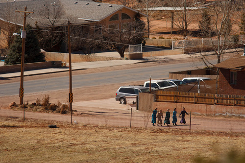 Trent Nelson  |  The Salt Lake Tribune
Young women on a walk in Hildale Monday, February 18, 2013. Much of the land in the southern Utah town, as well as in Colorado City across the Arizona border, is owned by the United Effort Plan Trust.