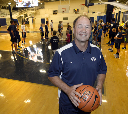 Al Hartmann  |  The Salt Lake Tribune
BYU women's basketball coach Jeff Judkins has taken the road less traveled in his coaching career.
This Summer he is running youth bakstbll camps at BYU.