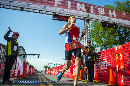 Chris Detrick  |  The Salt Lake Tribune
Fritz Van De Kamp, of Salt Lake City, crosses the finish line of the Salt Lake City marathon Saturday April 19, 2014. Van De Kamp won the marathon with a time of 2:28:18.