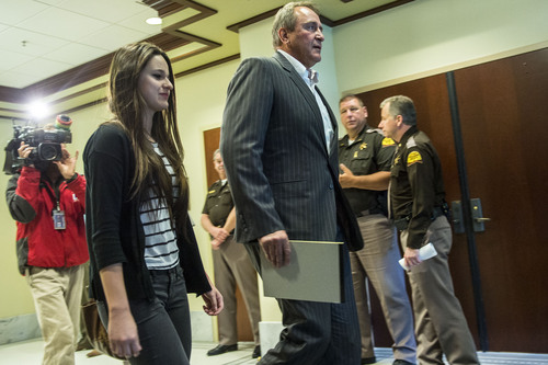 Chris Detrick  |  The Salt Lake Tribune
Former Attorney General Mark Shurtleff and his daughter Annie walk outside after a committee hearing at the State Capitol Wednesday June 18, 2014.