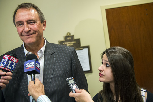 Chris Detrick  |  The Salt Lake Tribune
Former Attorney General Mark Shurtleff and his daughter Annie talk to members of the media after a committee hearing at the State Capitol Wednesday June 18, 2014.