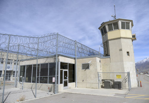 Al Hartmann  |  The Salt Lake Tribune 
Contol tower with razor wire and double fences at the Wasatch unit at the Utah State Prison in Draper.