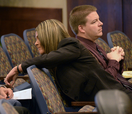 Al Hartmann  |  The Salt Lake Tribune 
Defense lawyer Lindsay Jarvis, left, represents Shaun Cowley in a pre-hearing conference before the West Valley City Civil Service Commission Tuesday February 18, 2014.  Shaun Cowley is fighting to get back on the West Valley City Police force.