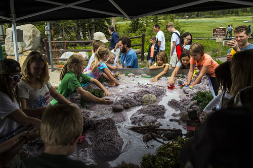 Chris Detrick  |  The Salt Lake Tribune
Kids learn about watershed during Kidís Day at Silver Lake at the top of Big Cottonwood Canyon on Saturday.