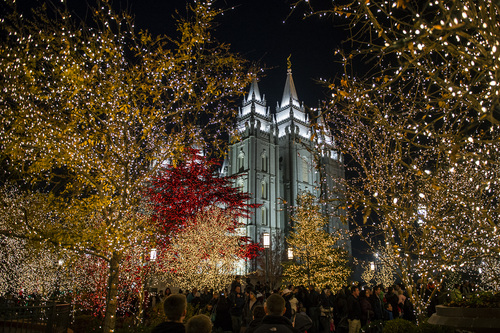 Chris Detrick  |  Tribune file photo
Visitors look at the Christmas lights on Temple Square Friday November 29, 2013.
