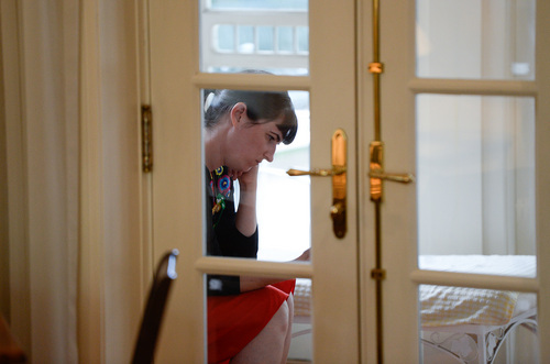 Francisco Kjolseth  |  The Salt Lake Tribune
Kate Kelly, founder of Ordain Women, checks messages of support and requests for interviews during a quiet moment at a bed and breakfast near downtown Salt Lake City after getting an official message through email that she has been excommunicated from The Church of Jesus Christ of Latter-day Saints on Monday, June 23, 2014.