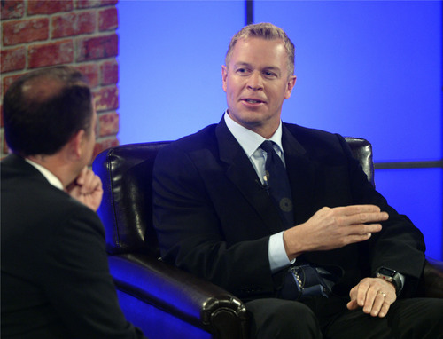 Al Hartmann  |  The Salt Lake Tribune 
KSL's Dave McCann, left, interviews  BYU head coach Bronco Mendenhall on a live TV program on the state of the BYU football program for 2014 Monday June 23.