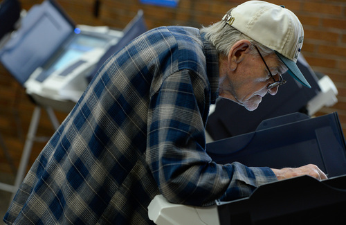Francisco Kjolseth  |  The Salt Lake Tribune
Long time Orem resident Jock Walker, 87, casts his vote in primary elections at the Government offices on Tuesday, June 24, 2014.