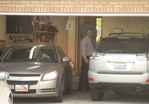 Rick Egan  |  The Salt Lake Tribune

FBI and local agents back a car into the garage of John Swallow's house during a search Monday June 2, 2014.
