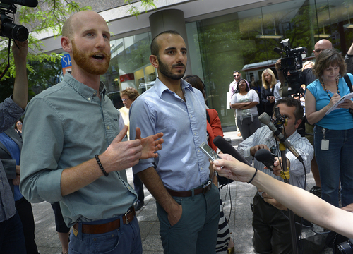 Scott Sommerdorf   |  The Salt Lake Tribune
Derek Kitchen, left, along with his partner Moudi Sbeity comment on the ruling from the 10th Circuit Court at a press conference with their attorney in Salt Lake City, Wednesday, June 25, 2014.