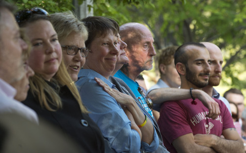 Steve Griffin  |  The Salt Lake Tribune


Attorney's and plaintiffs listen to Salt Lake County District Attorney Sim Gill as they join Utah Unites for Marriage at City Creek Park in Salt Lake City, Utah Wednesday, June 25, 2014, to celebrate the historic decision in Kitchen v. Herbert and stepping-stone toward the freedom to marry.