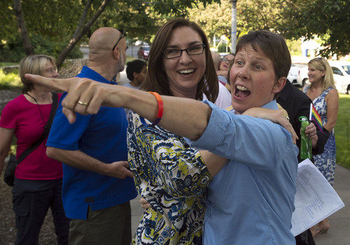 Steve Griffin  |  The Salt Lake Tribune


Plaintiff Kody Partridge smiles and points to a friend as she joined Utah Unites for Marriage at City Creek Park in Salt Lake City, Utah Wednesday, June 25, 2014, to celebrate the historic decision in Kitchen v. Herbert and stepping-stone toward the freedom to marry.