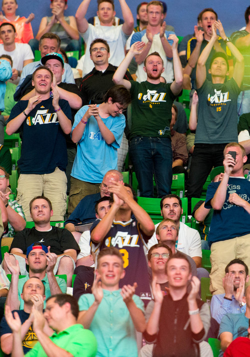 Trent Nelson  |  The Salt Lake Tribune
Fans at EnergySolutions Arena react in celebration as the Utah Jazz select Dante Exum in the NBA Draft in Salt Lake City, Thursday June 26, 2014.
