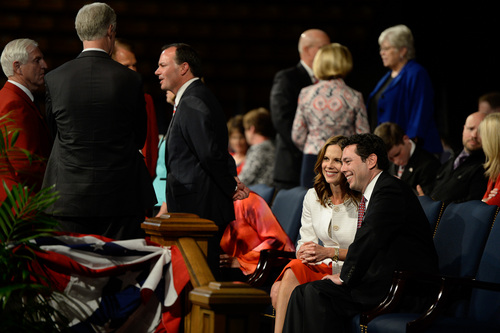 Francisco Kjolseth  |  The Salt Lake Tribune
Congressman Jason Chaffetz, joined by his wife Julie Marie attends the Provo Freedom Festival's Patriotic Service at the Marriott Center on the BYU campus on Sunday, June 29, 2014. In background at left is Senator Mike Lee.