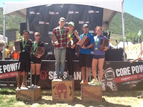 Winners of finishing the 2014 Spartan Race in Midway pose on June 26, 2014. From left to right are third place finishers Glenn Racz and Jenny Tobin, first place finishers John Yasko and Alex Roudayna, and second place finishers Cody Moat and Rose Wetzel. 

Tierra Smith | The Salt Lake Tribune