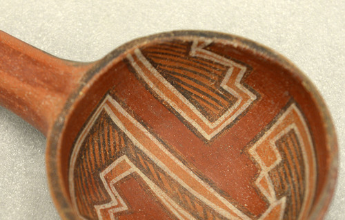 Al Hartmann  |  The Salt Lake Tribune
Fine polychrome water laddle is among the hundreds of artifacts the BLM seized in the Blanding raids five years ago.  This piece could have been used in religious cermony. All the items are now sorted and documented.  The BLM hopes to repatriate the ceremonial items to tribes and send other pieces to museums.  Unfortunately they have little information about where they were looted.