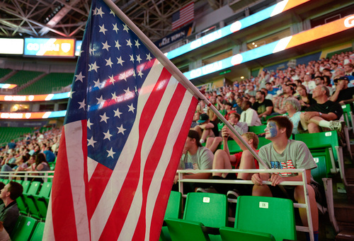 Francisco Kjolseth  |  The Salt Lake Tribune
Andrew Scharman keeps his flag ready should team U.S.A. score as he joins an estimated 4000 fans who crowded into Energy Solutions Arena for some World Cup action on the 42 by 24 feet long twin high definition screens to cheer on team U.S.A. against Germany on Thursday, June 26, 2014.