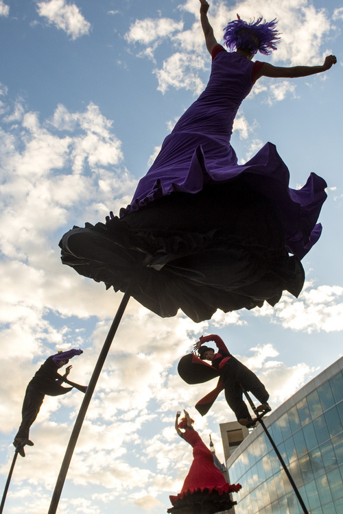 Chris Detrick  |  The Salt Lake Tribune
Australia's Strange Fruit members Angelica Cassimiro, Sonja Dale, Daniel Lupo and Jay Carlon perform at the Utah Arts Festival in Library Square Friday June 27, 2014. Australia's Strange Fruit performs theatrical acrobatics on five-meter poles, and will continue performing at the Utah Arts Festival Saturday and Sunday.