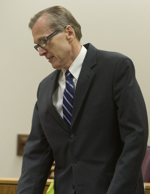 Rick Egan  |  The Salt Lake Tribune

Martin MacNeill enters the courtroom for his trial on forcible sexual abuse, Wednesday, July 2, 2014.