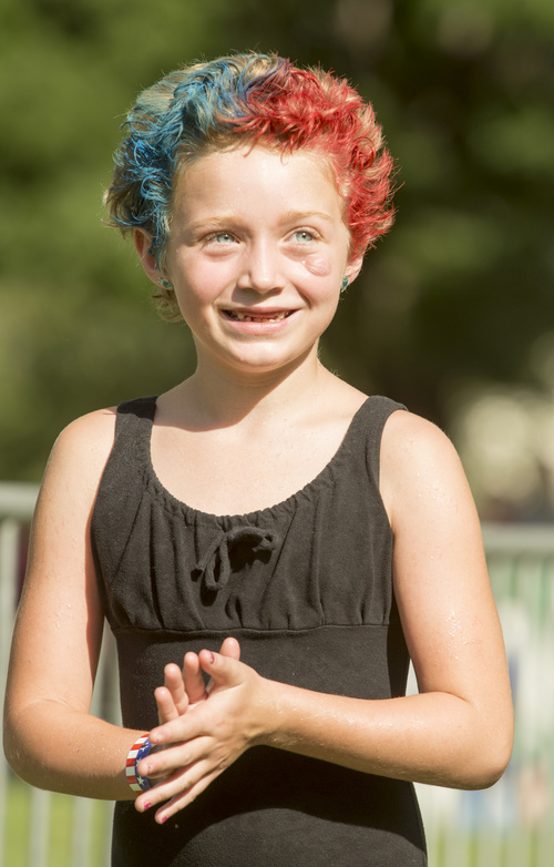 Rick Egan  |  The Salt Lake Tribune

Avavella Brand,  7 1/2, colored her hair for the Hurricane Independence day activities , Friday, July 4, 2014