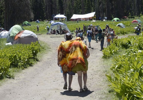 Al Hartmann  |  The Salt Lake Tribune 
Camping tents are widely dispersed over a large area for the  Rainbow Family Gathering in the Uinta Mountains 15 miles northeast of Heber.  There is a large circle in the camp center where communal meals are served and for special events.