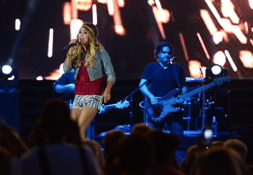 Scott Sommerdorf   |  The Salt Lake Tribune
Carrie Underwood performs at the "Stadium of Fire" in Provo, Friday, July 4, 2014.