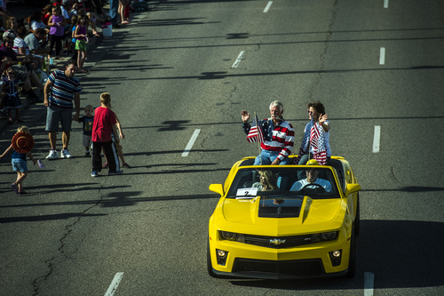 Chris Detrick  |  The Salt Lake Tribune
Former Murray Mayor Dan Snarr and his wife April participate in the Murray 2014 Fun Days Parade along State Street Friday July 4, 2014.