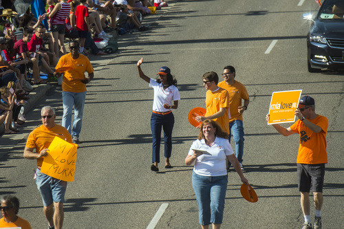 Chris Detrick  |  The Salt Lake Tribune
Mia Love participates in the Murray 2014 Fun Days Parade along State Street Friday July 4, 2014.