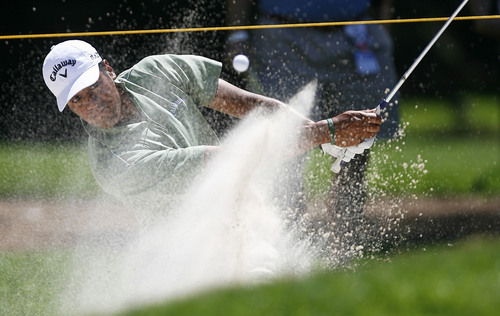 Francisco Kjolseth  |  The Salt Lake Tribune
Tony Finau of Lehi, UT, digs out of the sand in hole 2 in the Nationwide Tour, the Triple-A of the PGA Tour, as it makes its stop at the Willow Creek Country Club in Sandy on Thursday, July 28, 2011, for the first of four days.