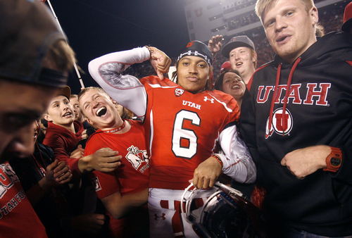 Scott Sommerdorf   |  The Salt Lake Tribune
Utah WR Dres Anderson (6) celebrates with fans on the field after Utah upset #5 Stanford 27-21, Saturday, October 12, 2013. Anderson was named to the 2014 watchlist for the Maxwell Award, which is annually given to college football's best player.