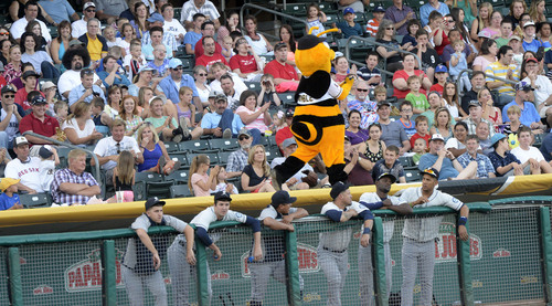 Al Hartmann  |  The Salt Lake Tribune 
"Bumble" the Bees mascot tries to raise fans excitment during Bees-Tacoma game Monday July 7.
