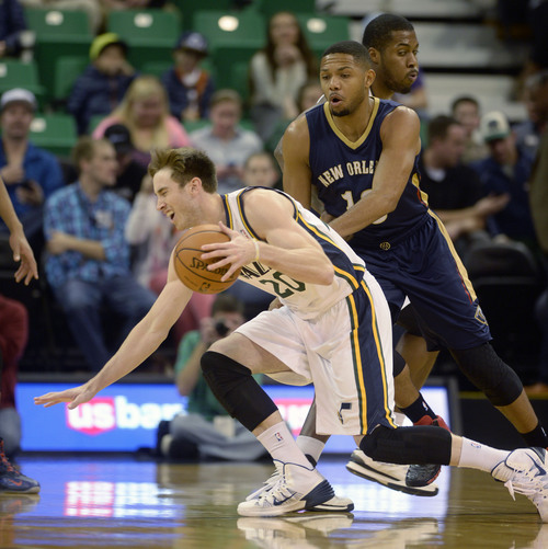Steve Griffin  |  The Salt Lake Tribune


 Utah Jazz shooting guard Gordon Hayward #20 gets tripped up by New Orleans Pelicans shooting guard Eric Gordon #10 during first half action in the Jazz versus New Orleans Pelicans basketball game at EnergySolutions Arena in Salt Lake City, Utah Thursday, November 14, 2013.