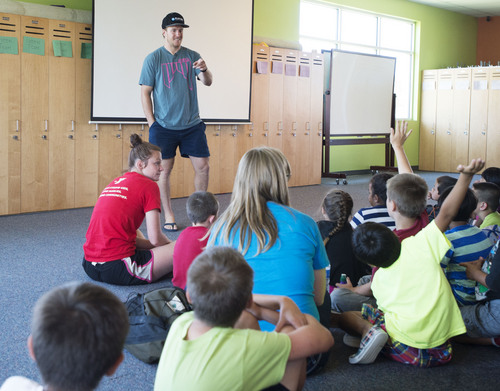 Steve Griffin  |  The Salt Lake Tribune


Olympic champion Ted Ligety answers questions from children as he visits the Taylorsville YMCA Summer Day Camp in Taylorsville, Utah Monday, July 7, 2014.  This past winter the YMCA of Northern Utah partnered with the U.S. Ski and Snowboard Association, National Winter Sports Education, Ted Ligety and Park City Mountain Resort to give youth in the YMCA programs a chance to learn how to ski.