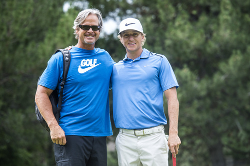 Chris Detrick  |  The Salt Lake Tribune
Scott Pinckney and his dad Doug pose for a portrait in the Utah Championship Pro-Am at Willow Creek Country Club Wednesday July 9, 2014.