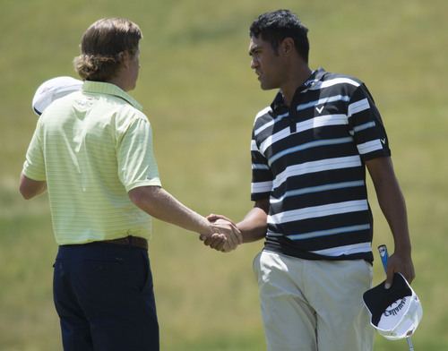 Steve Griffin  |  The Salt Lake Tribune


Lehi resident Tony Finau, right, shakes hands with Derek Fathauer after they finished their round during first round play in the Web.Com golf tour event at Willow Creek Country Club  in Sandy, Utah Thursday, July 10, 2014.