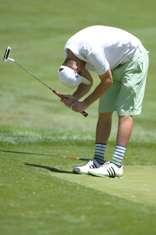 Leah Hogsten  |  The Salt Lake Tribune
Preston Richards is frustrated with his putt on the 6th green during afternoon play. Richards lost to Jon Wright who became the 116th Utah State Amateur golf tournament winner for the second time Saturday, July 11, 2014 at Ogden Golf and Country Club.