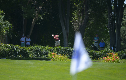 Leah Hogsten  |  The Salt Lake Tribune
Jon Wright hits off the 7th tee. Wright became the 116th Utah State Amateur golf tournament winner for the second time Saturday, July 11, 2014 at Ogden Golf and Country Club.