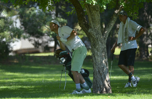 Leah Hogsten  |  The Salt Lake Tribune
Preston Richards hits to the 14th green during afternoon play. Richards lost to Jon Wright who became the 116th Utah State Amateur golf tournament winner for the second time Saturday, July 11, 2014 at Ogden Golf and Country Club.