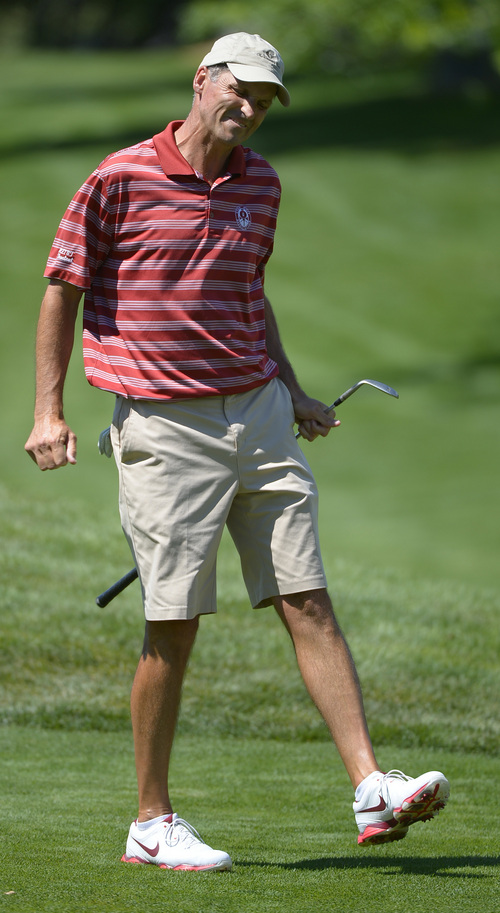 Leah Hogsten  |  The Salt Lake Tribune
Jon Wright is frustrated on the 13th tee. Wright became the 116th Utah State Amateur golf tournament winner for the second time Saturday, July 11, 2014 at Ogden Golf and Country Club.