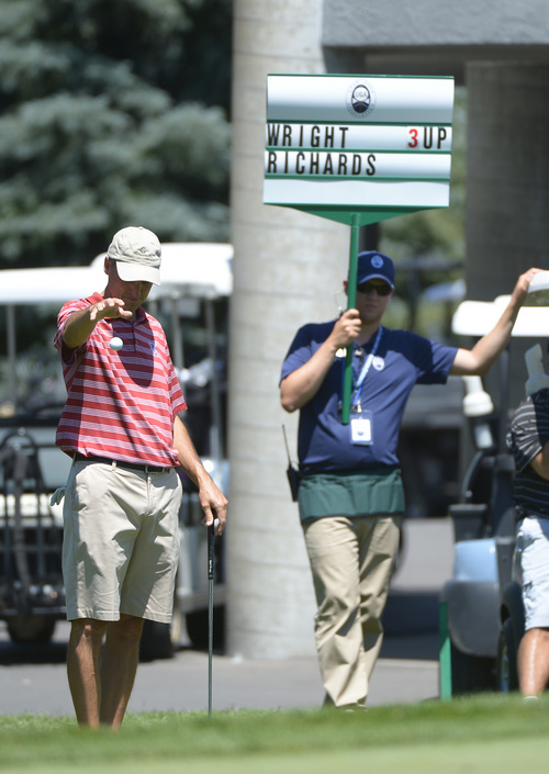 Leah Hogsten  |  The Salt Lake Tribune
Jon Wright drops near the 9th green. Wright became the 116th Utah State Amateur golf tournament winner for the second time Saturday, July 11, 2014 at Ogden Golf and Country Club.