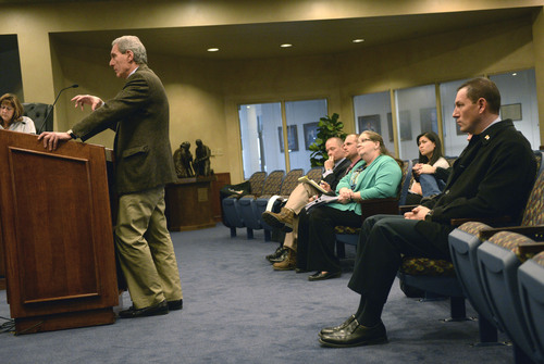Al Hartmann  |  The Salt Lake Tribune
West Valley City Police Lt. John Coyle, right, appears at the West Valley City Civil Service Commission Thursday January 16.   His attorney Erik Strindberg addresses the commission on his behalf.