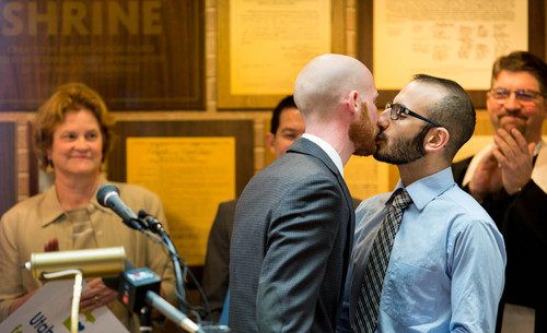 Trent Nelson  |  Tribune file photo
Derek Kitchen and Moudi Sbeity kiss after speaking at a press conference announcing a public education campaign, Utah Unites for Marriage, in Salt Lake City, Tuesday, March 18, 2014.