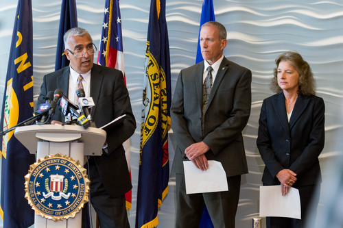 Trent Nelson  |  The Salt Lake Tribune
Salt Lake County District Attorney Sim Gill speaks about the arrest of former Utah Attorneys General Mark Shurtleff and John Swallow at a press conference at FBI headquarters in Salt Lake City, Tuesday July 15, 2014. At his left are Public Safety Commissioner Keith Squires and Mary Rook, special agent in charge of the FBI office in Salt Lake City.