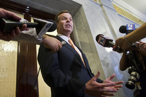Chris Detrick  |  The Salt Lake Tribune

Attorney General John Swallow talks to members of the media outside of his office at the Utah State Capitol Wednesday June 19, 2013.